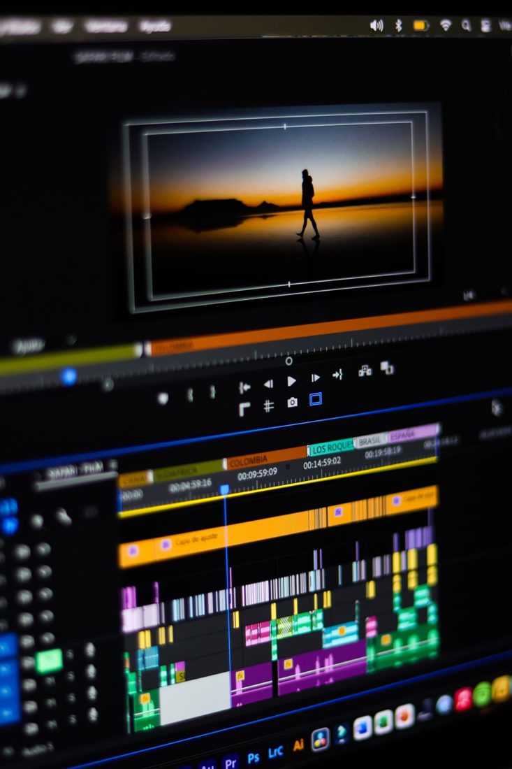 A video editing timeline and image preview on a monitor.